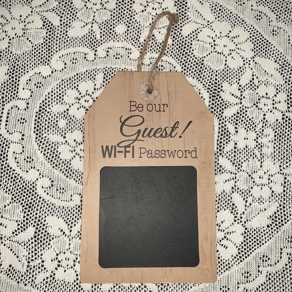 Wall decor sign. Brown and black board.
